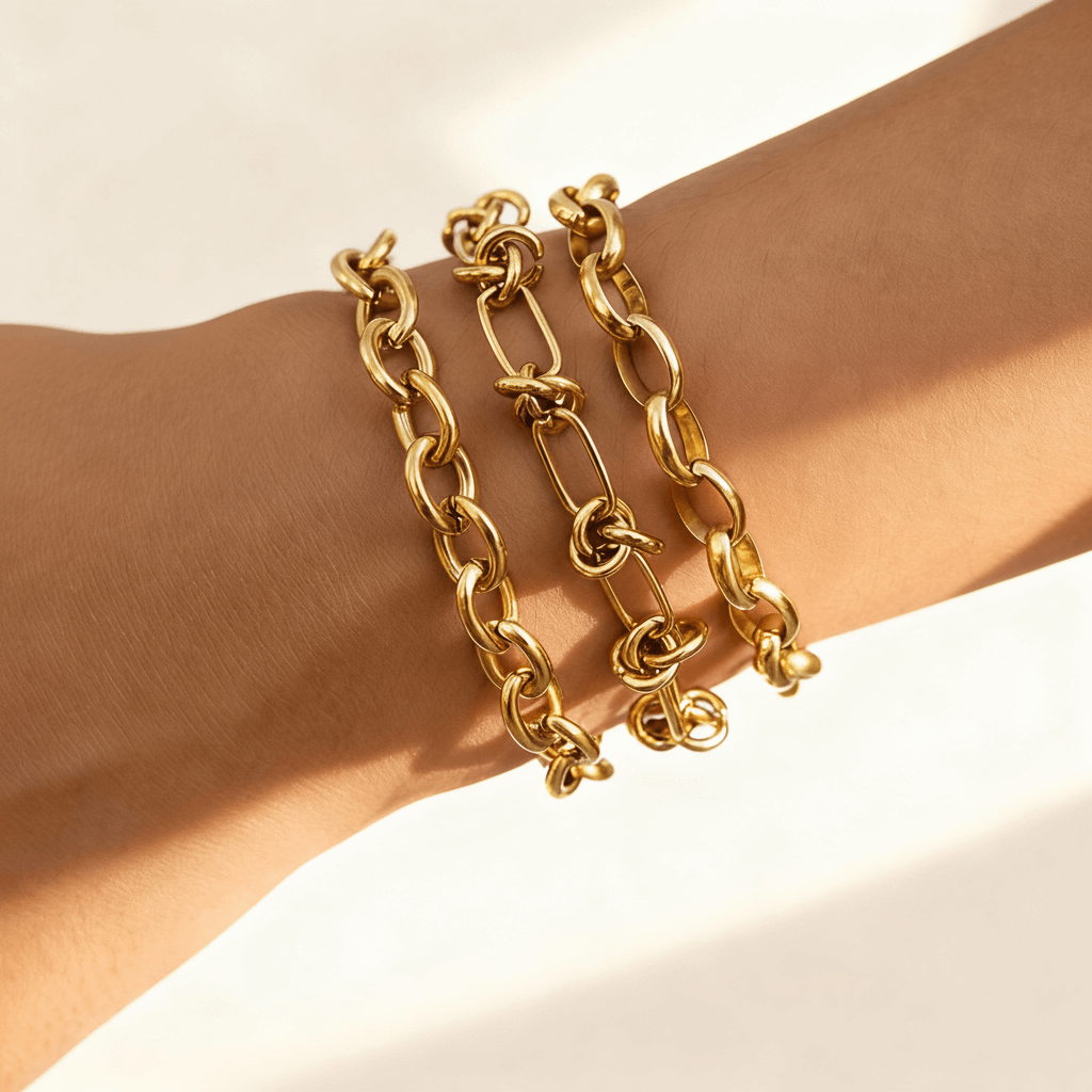 A bold, statement stack featuring three of the chunkiest waterproof bracelets from The Amalfi Layering Set layered on a model's wrist for a high-impact look.