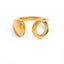 Asymmetrical teardrop open ring gold stainless steel liquid metal design.