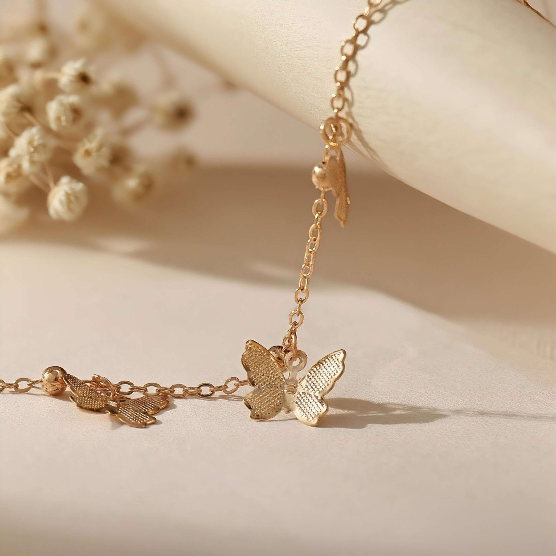 Butterfly Pendant Handmade Anklet — delicate butterfly charm on adjustable anklet chain, elegant summer accessory.
