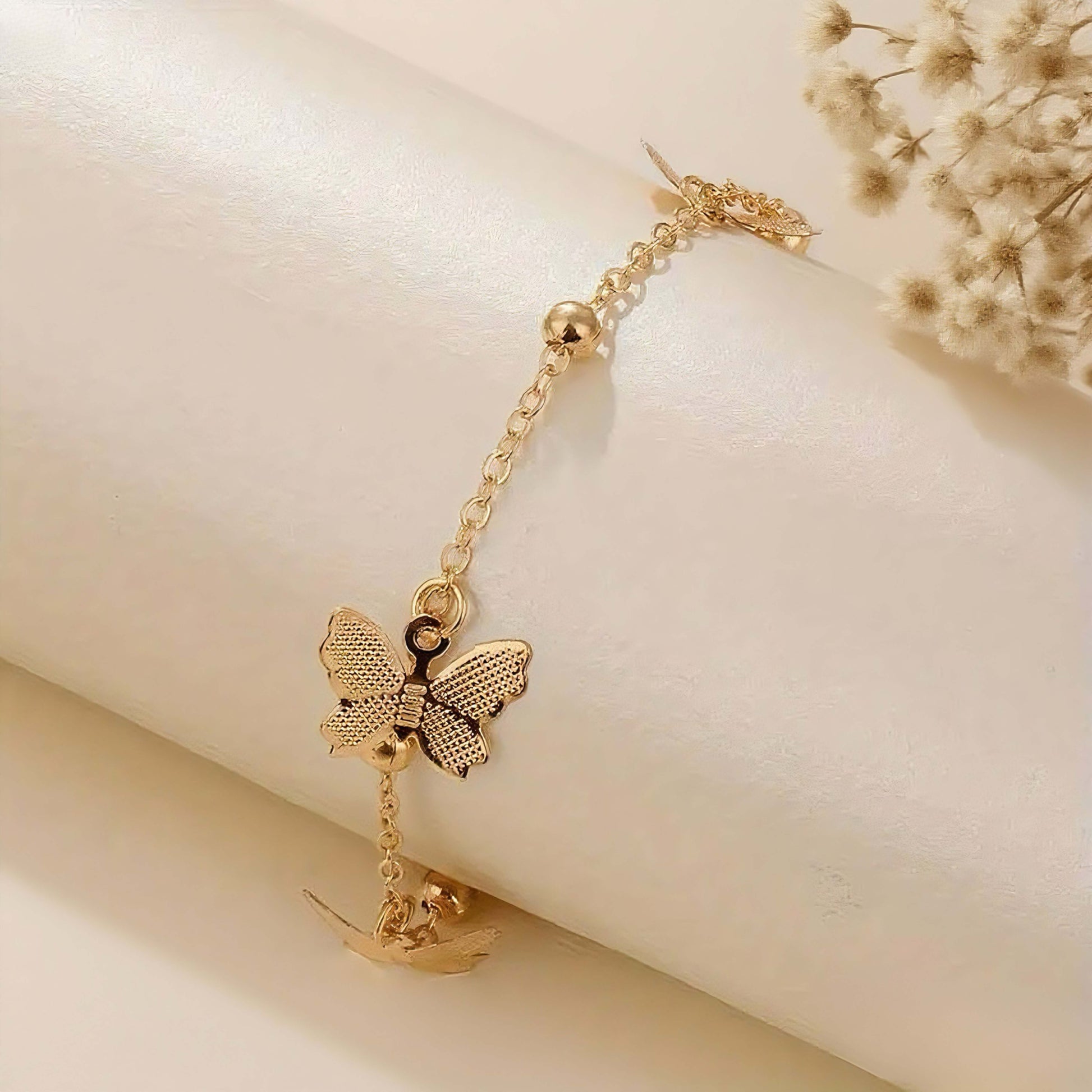 Butterfly Pendant Handmade Anklet — delicate butterfly charm on adjustable anklet chain, elegant summer accessory.