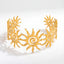 Gold celestial sun open cuff bracelet with triple spiral cutout design stainless steel.