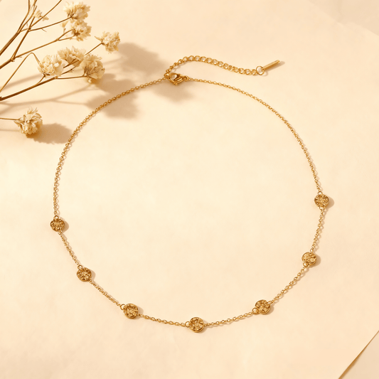 Luminova Dainty Bezel Station Gold Necklace with an empty setting, isolated on a white gold background.