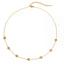 Gold delicate chain necklace with spaced bezel set cubic zirconia waterproof stainless steel.