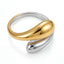 Two-tone mixed metal open ring with gold and silver teardrop ends adjustable band.