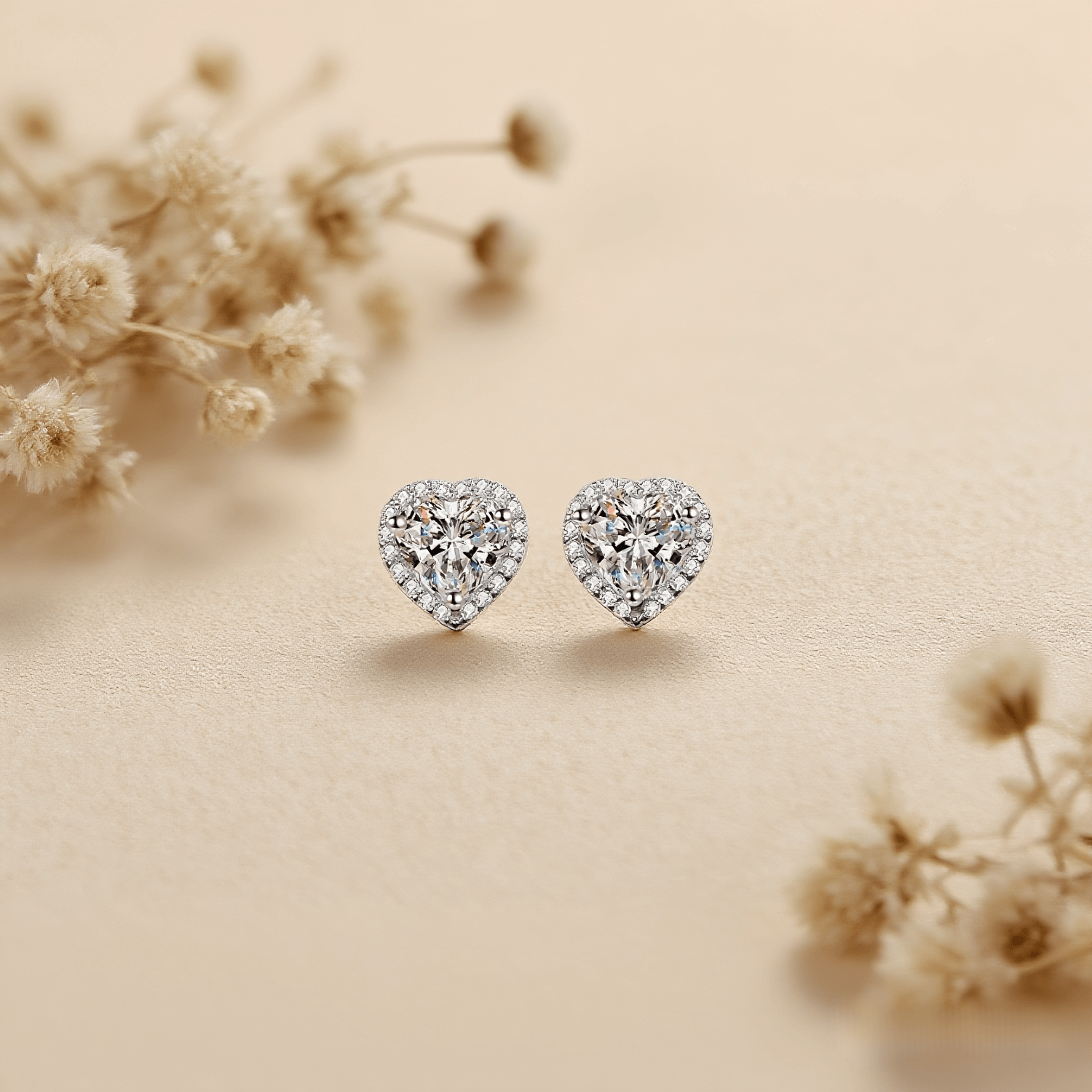 Gleaming Heart Moissanite Earrings — heart-shaped moissanite stud earrings in sterling silver, symbolic and beautiful gift.