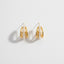 Gold triple band hoop earrings with pearl detail waterproof stainless steel jewelry.