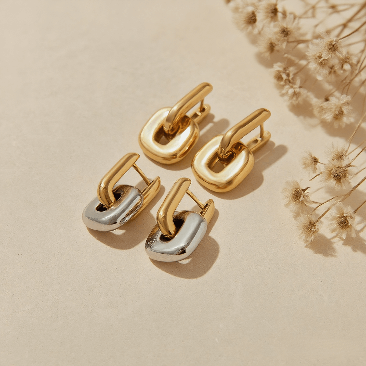 Urban Link Earrings — polished sculptural link earrings in gold / dual-tone, modern and bold design.