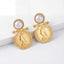 Pair of vintage pearl and gold coin drop earrings waterproof stainless steel.