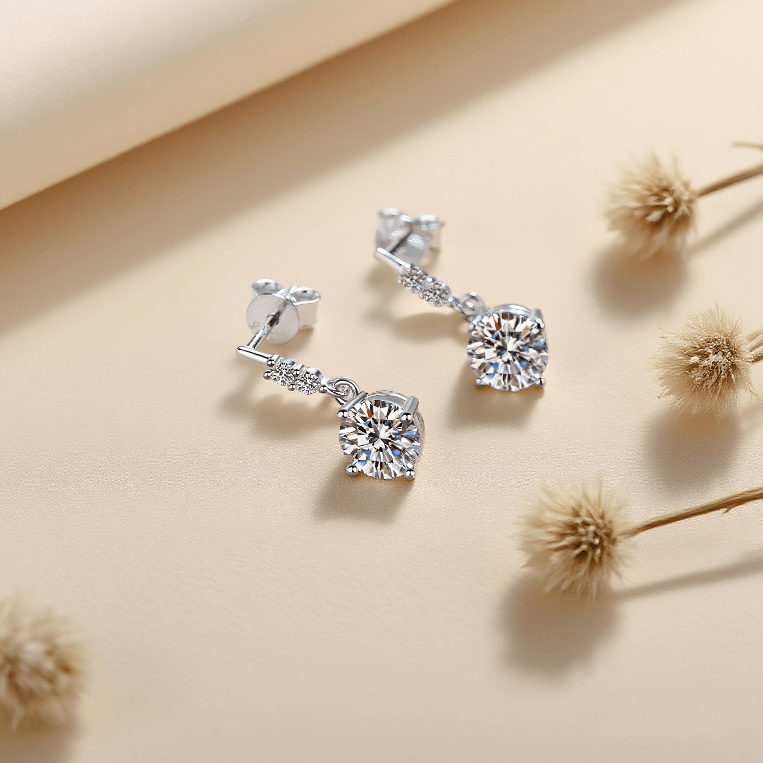 Fairy Drop Moissanite Earrings — delicate dangle earrings with sparkling moissanite drops, capturing ethereal everyday magic.