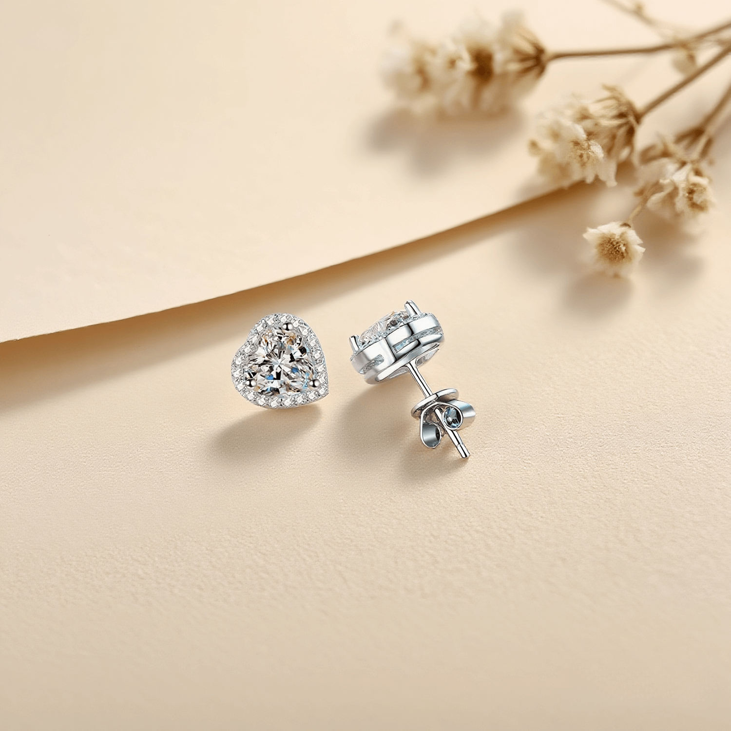 Gleaming Heart Moissanite Earrings — sterling silver heart-shaped stud earrings with sparkling moissanite, romantic and elegant gift.