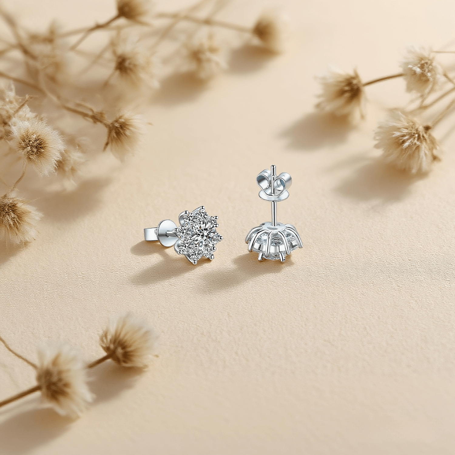 Arctic Sparkle Moissanite Earrings — teardrop moissanite studs styled on frosty background, symbolizing clarity and elegance.