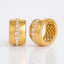 Pair of wide gold hoop earrings with central cubic zirconia line waterproof stainless steel.