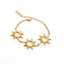 Gold chain bracelet with three sunburst charms waterproof stainless steel.