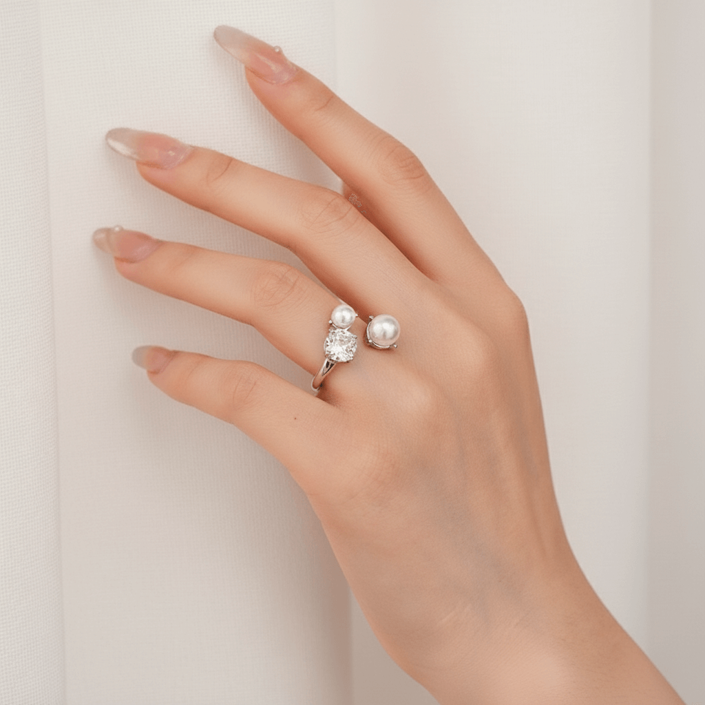 A model's hand, adorned with The Celestial Ring, holding a handwritten card with calligraphy. This romantic scene positions the ring as the perfect gift for an anniversary, engagement, or a declaration of love.