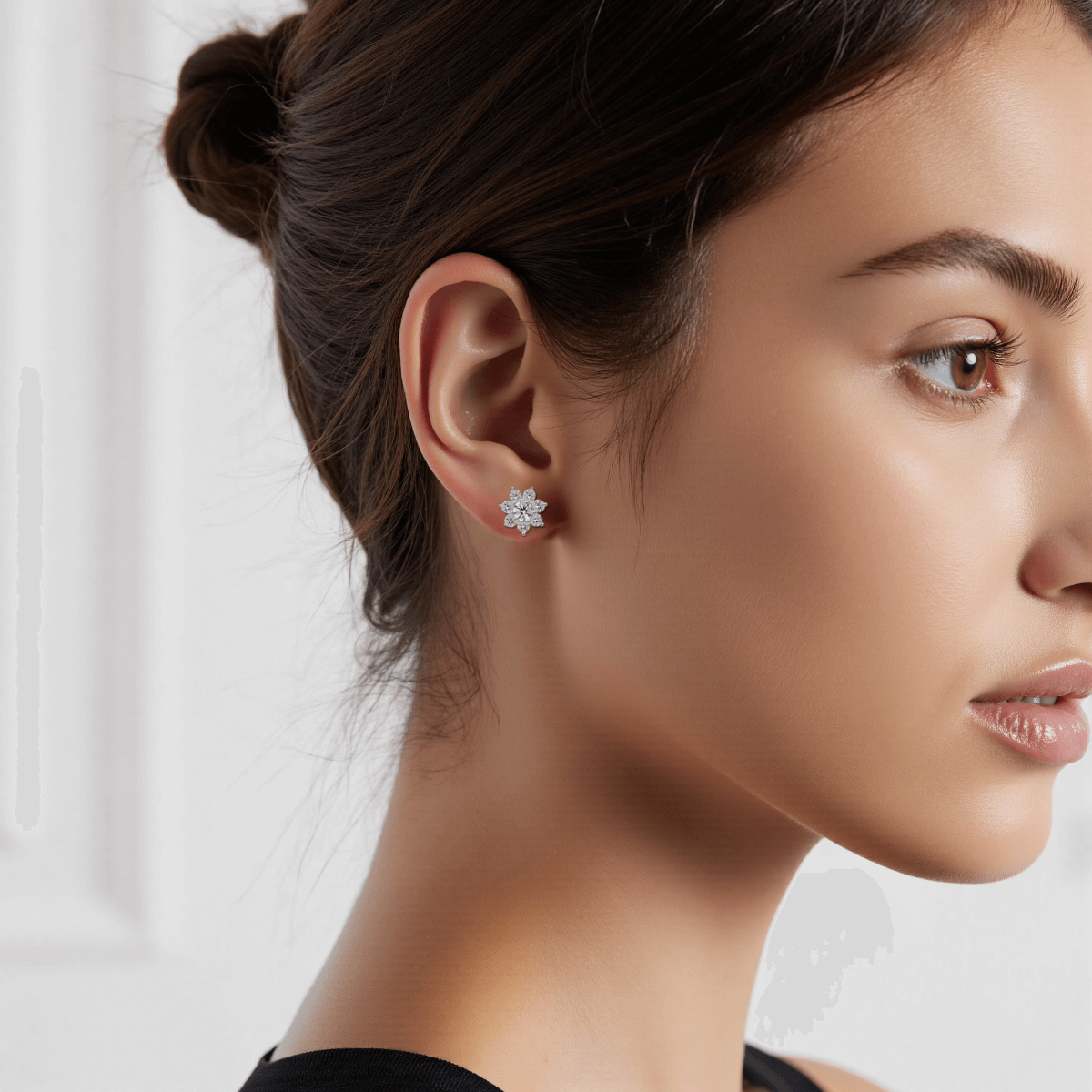 Arctic Sparkle Moissanite Earrings — teardrop moissanite studs styled on frosty background, symbolizing clarity and elegance.