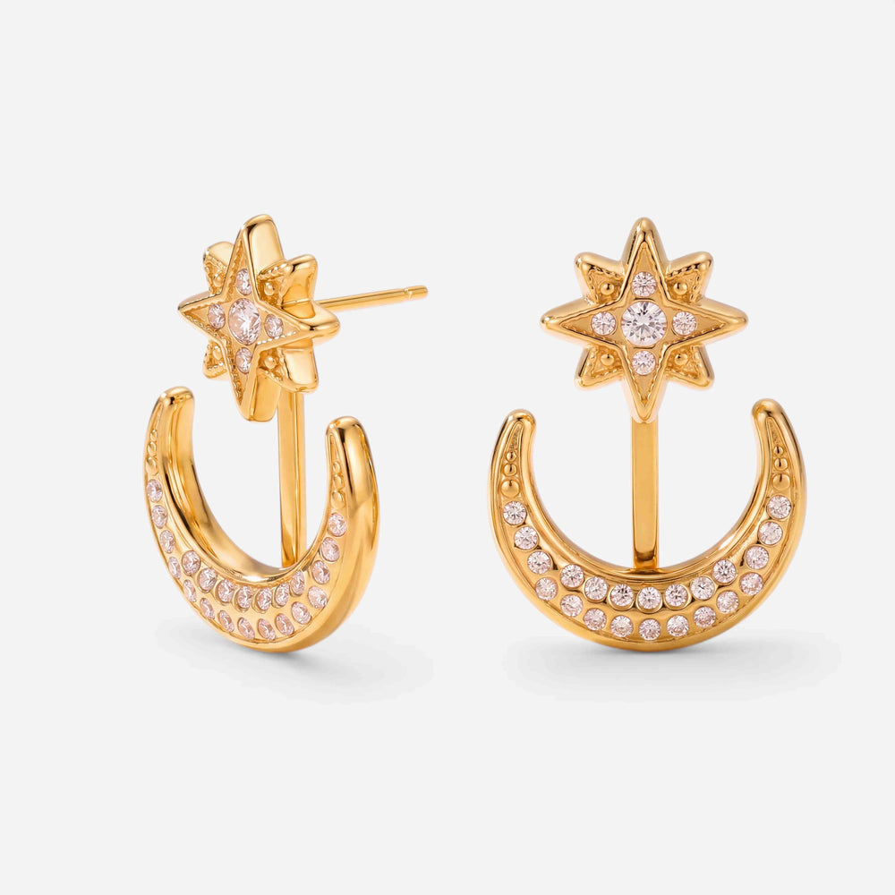 Pair of gold convertible front back earrings with crystal star and moon design.