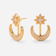 Pair of gold convertible front back earrings with crystal star and moon design.