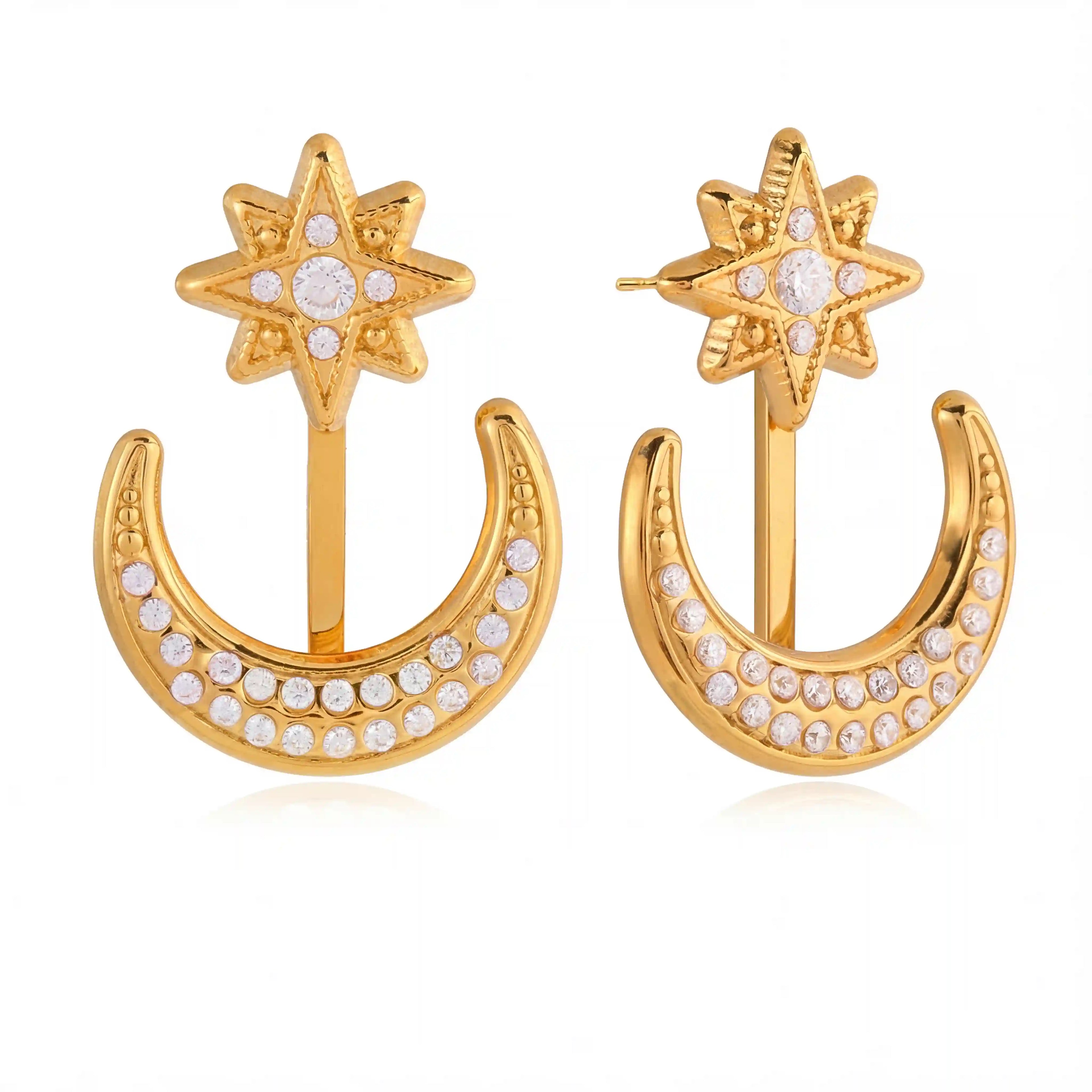 Pair of gold convertible front back earrings with crystal star and moon design.