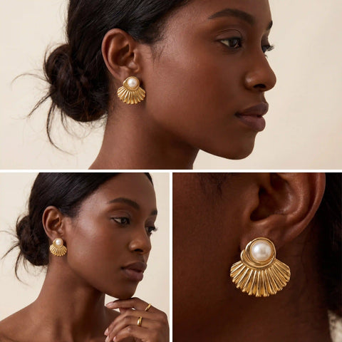 Dark skin model wearing gold scallop shell earrings with pearl mermaidcore vibe.