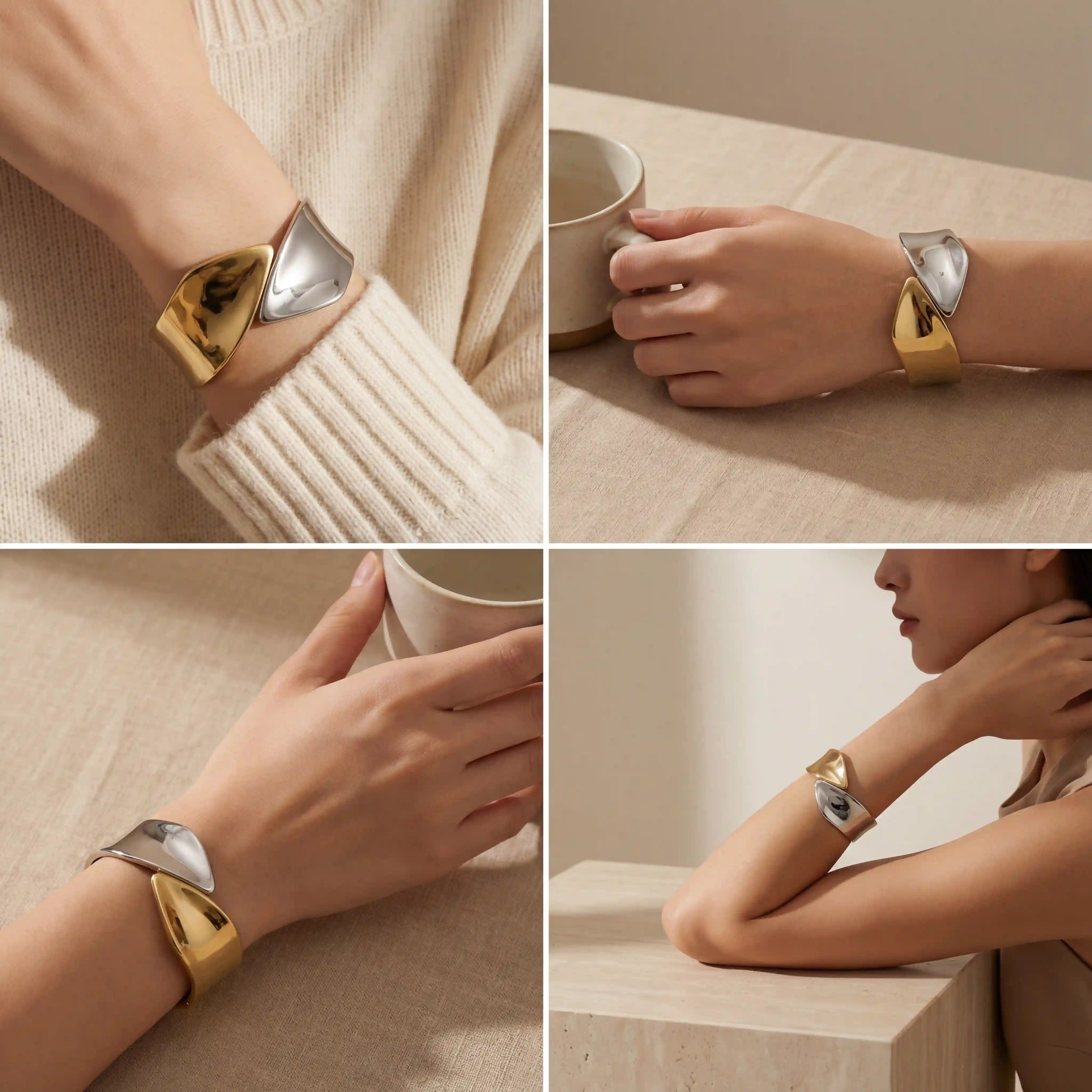 Lifestyle styling of chunky two-tone cuff bracelet on woman with beige sweater.
