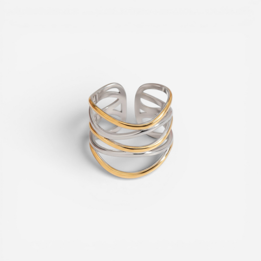 Mixed metal two-tone ring gold and silver crossover design wide band.