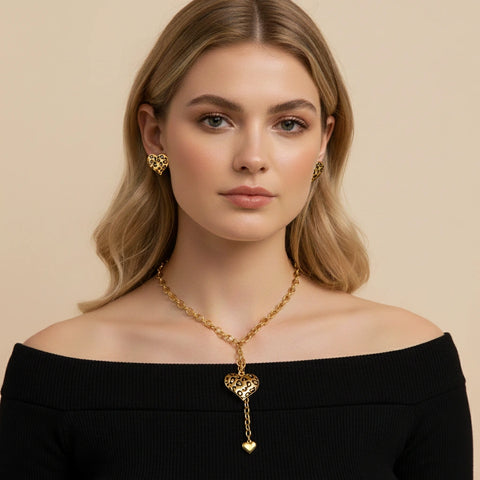 A model in a chic off-the-shoulder top, where The Artemis Lariat acts as the perfect bold centerpiece, drawing attention to the neckline.