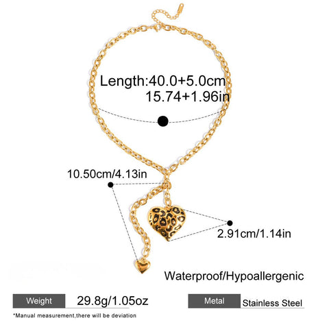 Product specification graphic for The Artemis Lariat, detailing its chain length, pendant sizes, and icons for its waterproof and hypoallergenic materials.