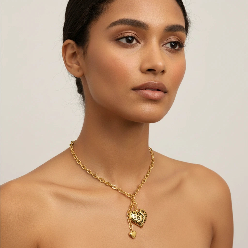 A stunning model wearing The Artemis Lariat with bare shoulders, emphasizing the necklace's sensual, plunging Y-shape design.