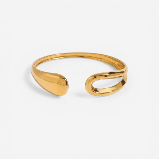 Asymmetrical teardrop open cuff bracelet gold stainless steel liquid metal design.