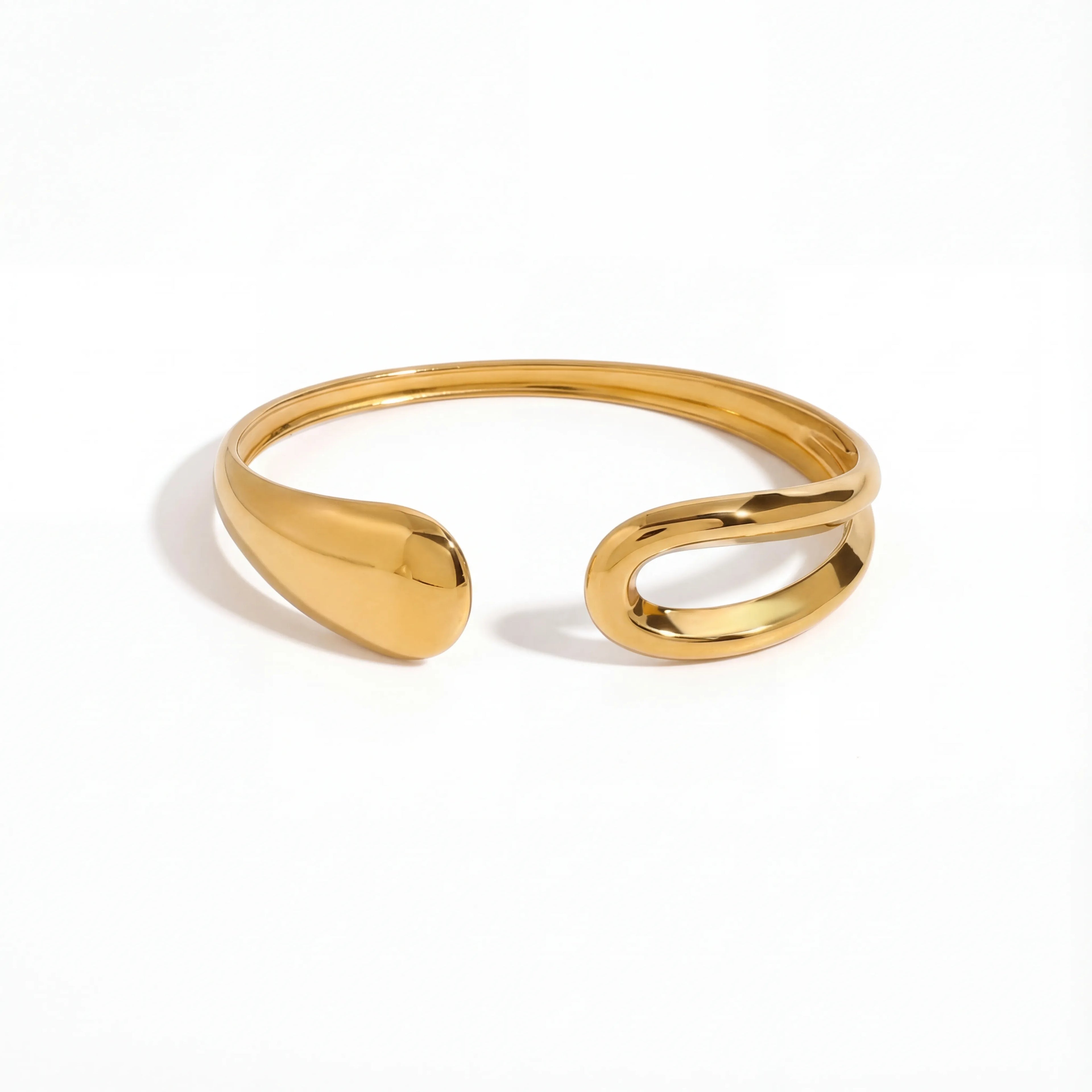 Asymmetrical teardrop open cuff bracelet gold stainless steel liquid metal design.