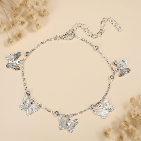 Butterfly Pendant Handmade Anklet — close-up of delicate butterfly charm on adjustable anklet chain, summer accessory.