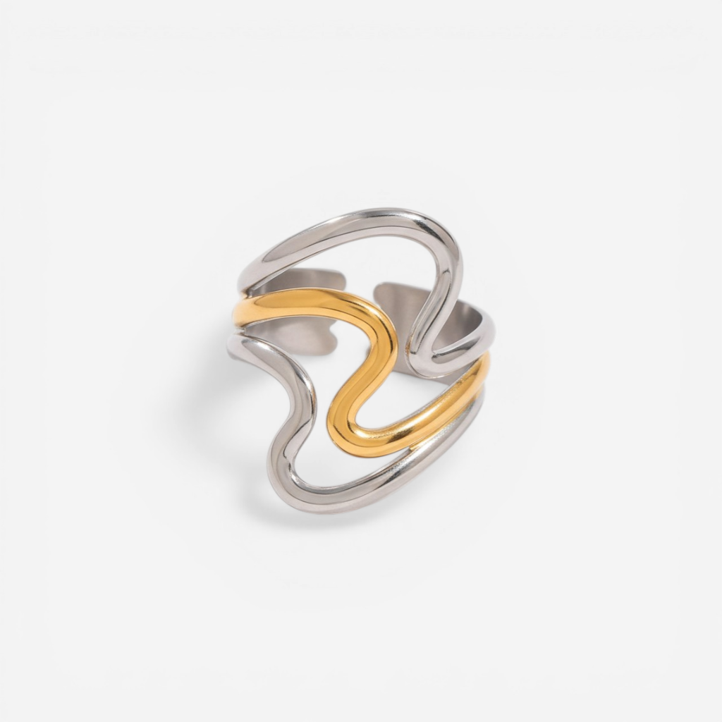 Mixed metal two-tone wavy ring gold and silver contrast band.