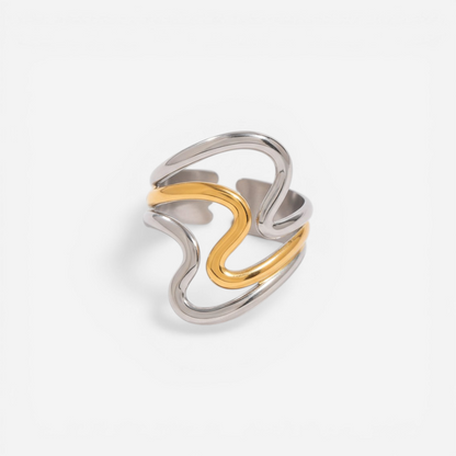 Mixed metal two-tone wavy ring gold and silver contrast band.