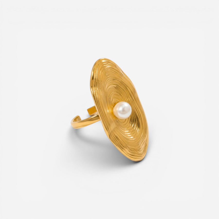 Calypso ring hammered gold texture oval shape with pearl center waterproof stainless steel.