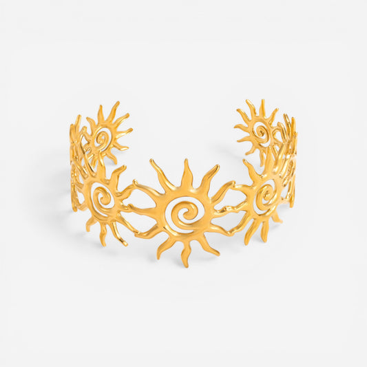 Gold celestial sun open cuff bracelet with triple spiral cutout design stainless steel.