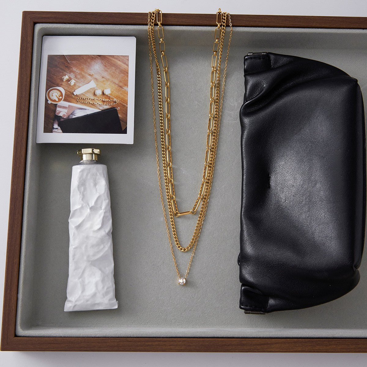 The Charites Necklace styled as the centerpiece of a luxurious gift set, showcasing it as the perfect present for a special occasion.