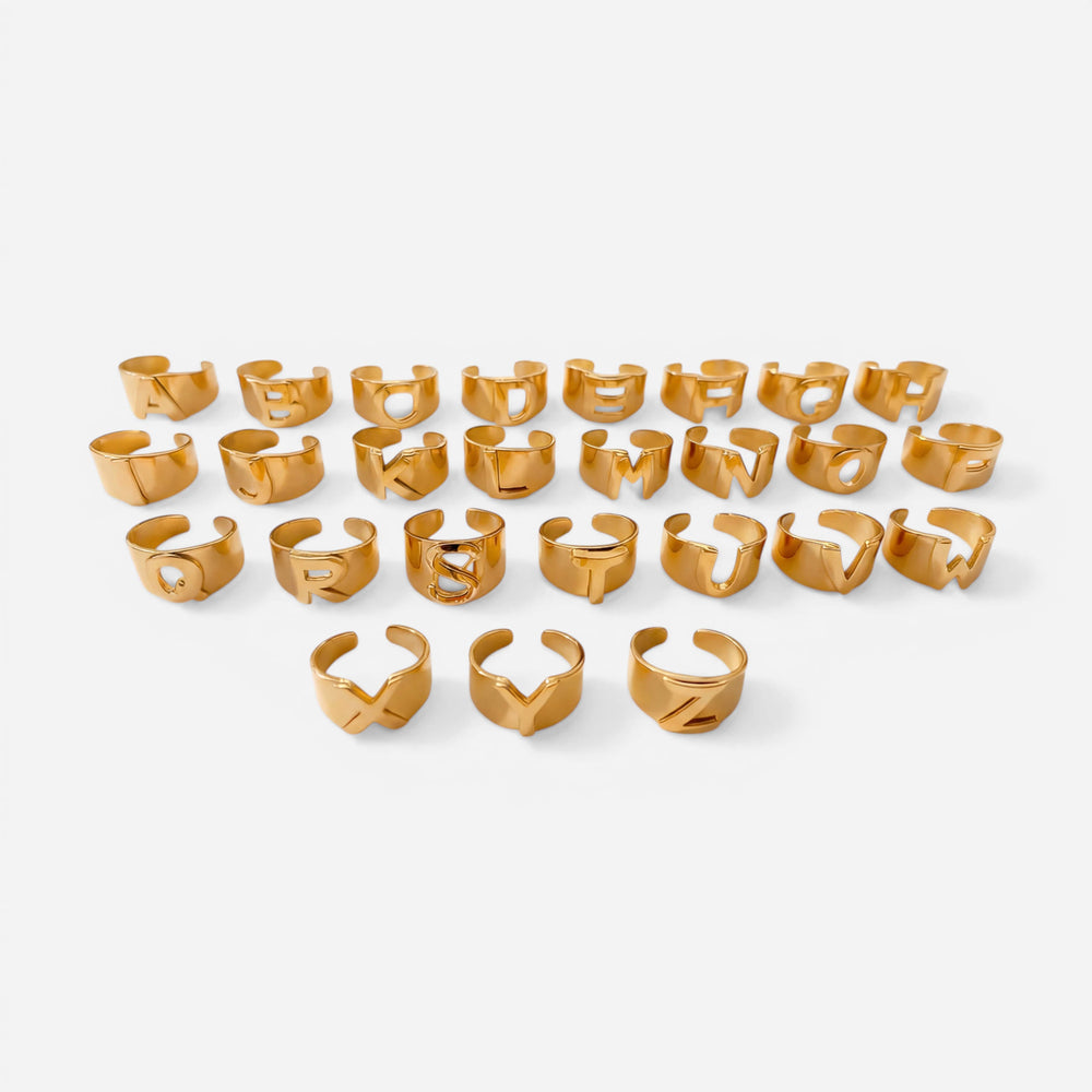 Full collection of gold alphabet initial rings A to Z personalized jewelry for women.