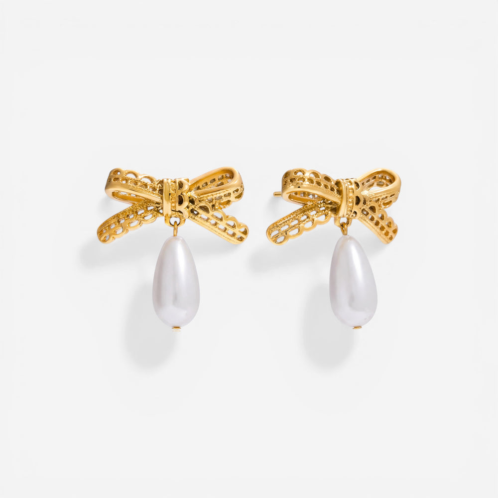 Pair of gold ribbon bow earrings with pearl drop waterproof stainless steel.