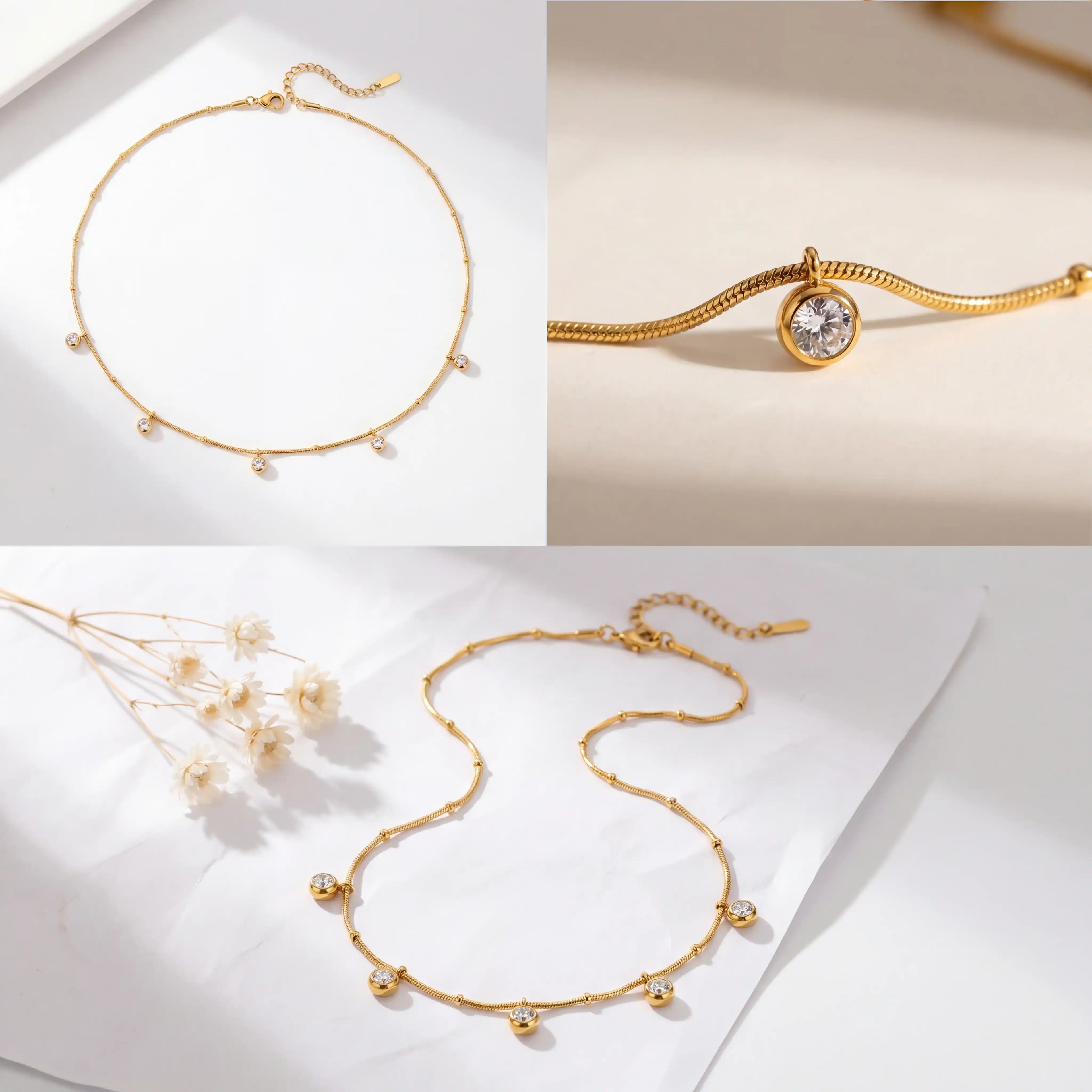Aesthetic product photography of delicate gold drop necklace details on white background.