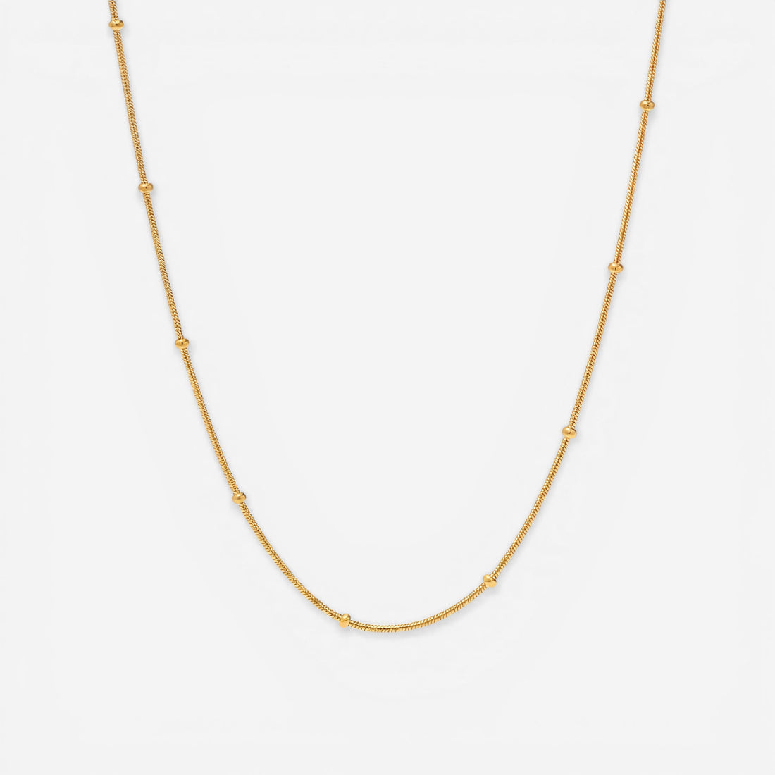 Gold dotted chain necklace with small metal beads station design waterproof stainless steel.