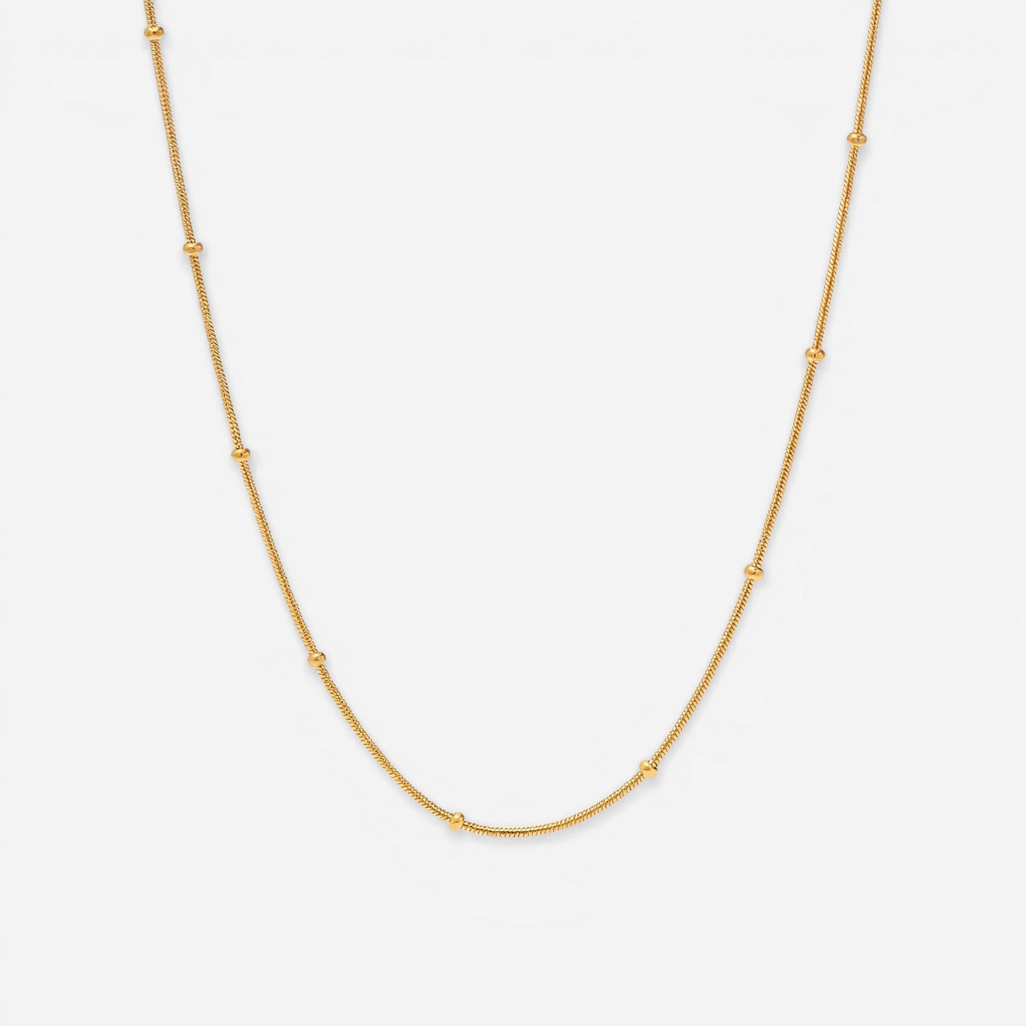 Gold dotted chain necklace with small metal beads station design waterproof stainless steel.