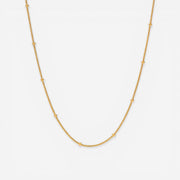 Gold dotted chain necklace with small metal beads station design waterproof stainless steel.