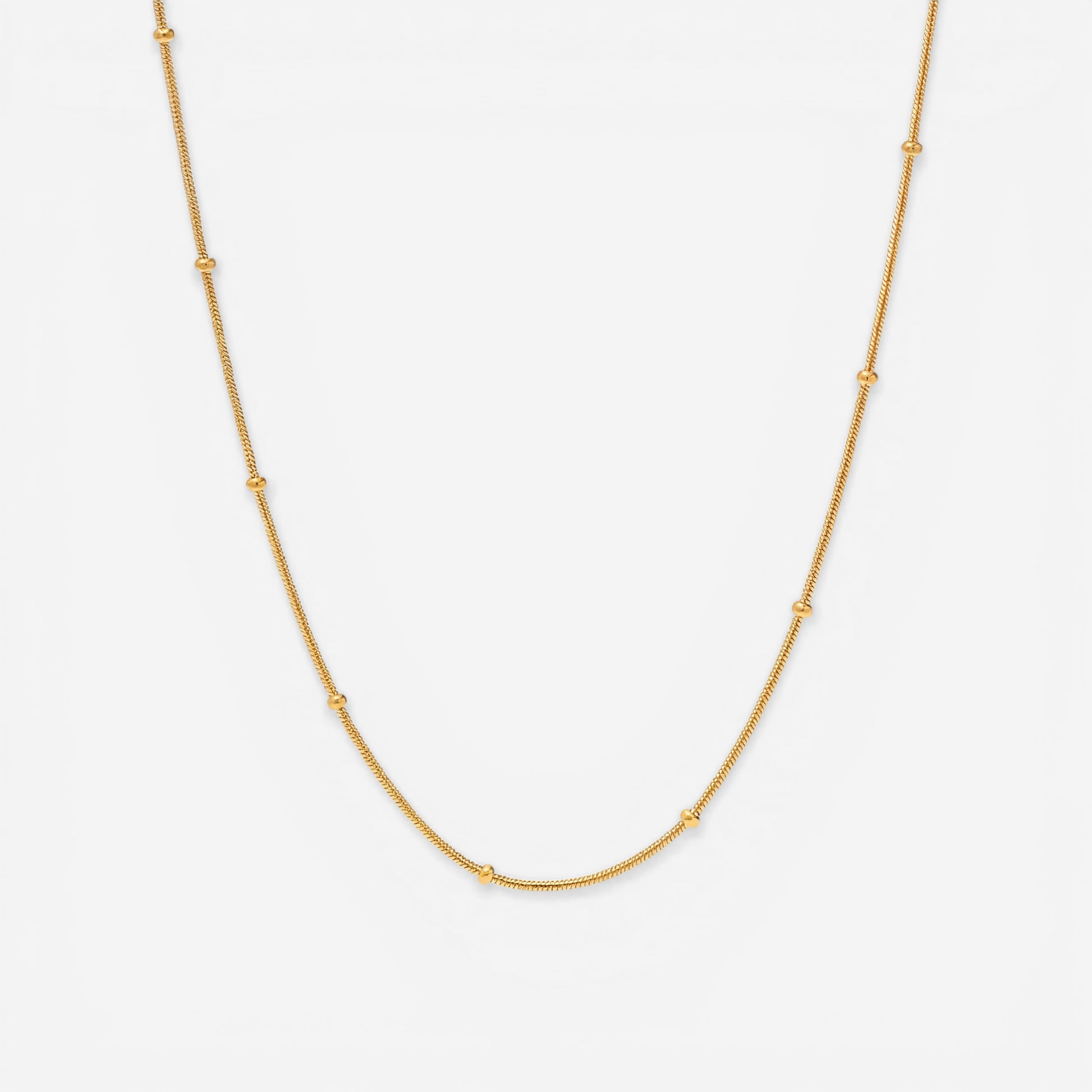 Gold dotted chain necklace with small metal beads station design waterproof stainless steel.