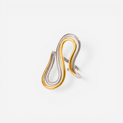 Mixed metal two-tone drift ring gold and silver sculptural band.