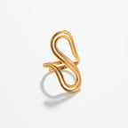 Gold drift ring with abstract fluid curve design waterproof stainless steel.