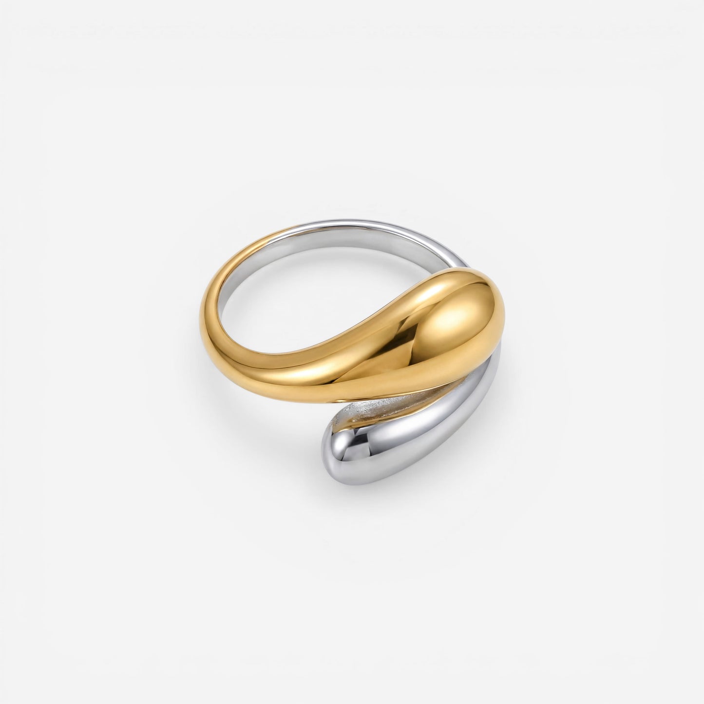 Two-tone mixed metal open ring with gold and silver teardrop ends adjustable band.