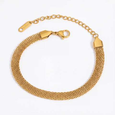 Gold mesh bracelet flat woven stainless steel chain on white background.