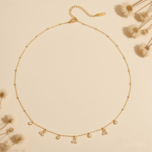Golden Dew Necklace — 18K gold plated dew-drop style pendant on 40 cm chain with extender, romantic everyday accessory.