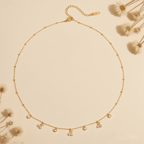 Golden Dew Necklace — 18K gold plated dew-drop style pendant on 40 cm chain with extender, romantic everyday accessory.