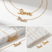 Aesthetic product photography of gold and silver love script necklaces on marble background.